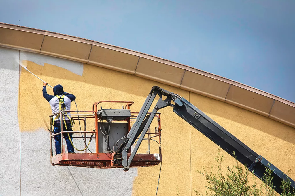 professional-painter-painting-commercial-building-exterior-1024x683